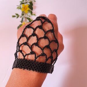 Black Beaded fishnet bracelet torn ring attach, size 4.5 on ring 💍